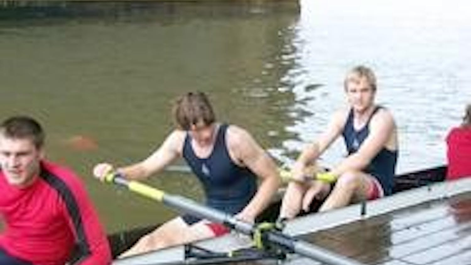 Above, from left to right, Ashton Rodgers, Michael Harold and Jason Obold dock after the men's heavyweight four race