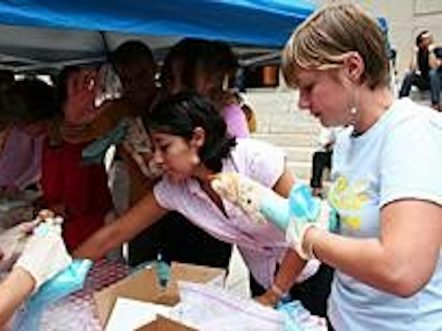 Italians and non-Italians came together in Chinatown to enjoy making pastries.