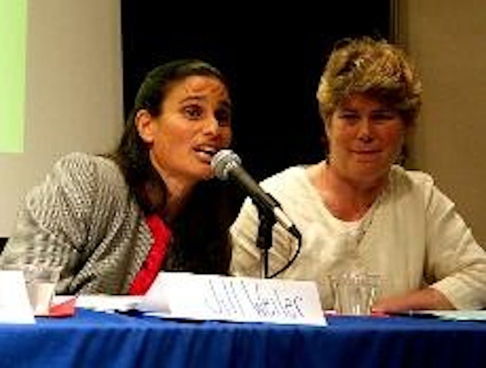 Jill Weiler speaks at a panel Tuesday night about influential programs in D.C. public schools.