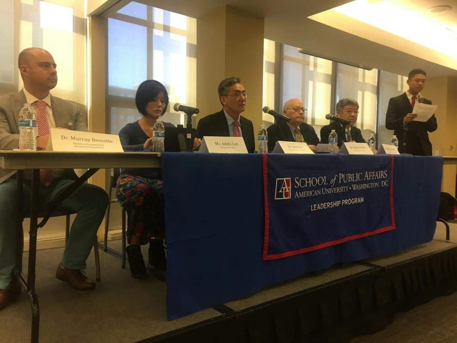 Murray Bessette, Adela Lan, Larry Liu, Burton Wides and Ning Xianhua take their seats as they discuss the recent events in China.&nbsp;
