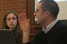 GOING GREEN - SIS instructor Simon Nicholson speaks at a panel discussion Thursday night to inform students of the new SIS building's designers' green plans. Nicholson, who is on the building committee for the new building, said it will be environmentally