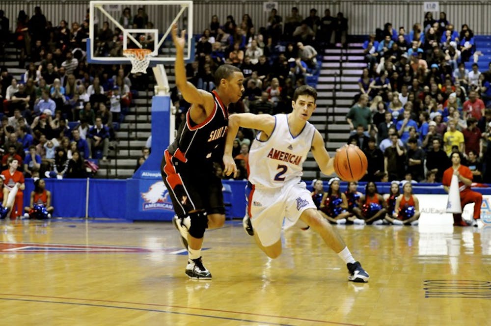 MAKING AN IMPACT â€” Point guard Daniel Munoz looks to dribble past his defender in Fridayâ€™s season opener at Bender Arena. The sophomore point guard netted 10 points and two rebounds in 24 minutes off the bench. The Eagles return to Bender Arena on Wednesday, Nov. 17 to take on the University of Maryland-Eastern Shore Hawks at 7:30 p.m.