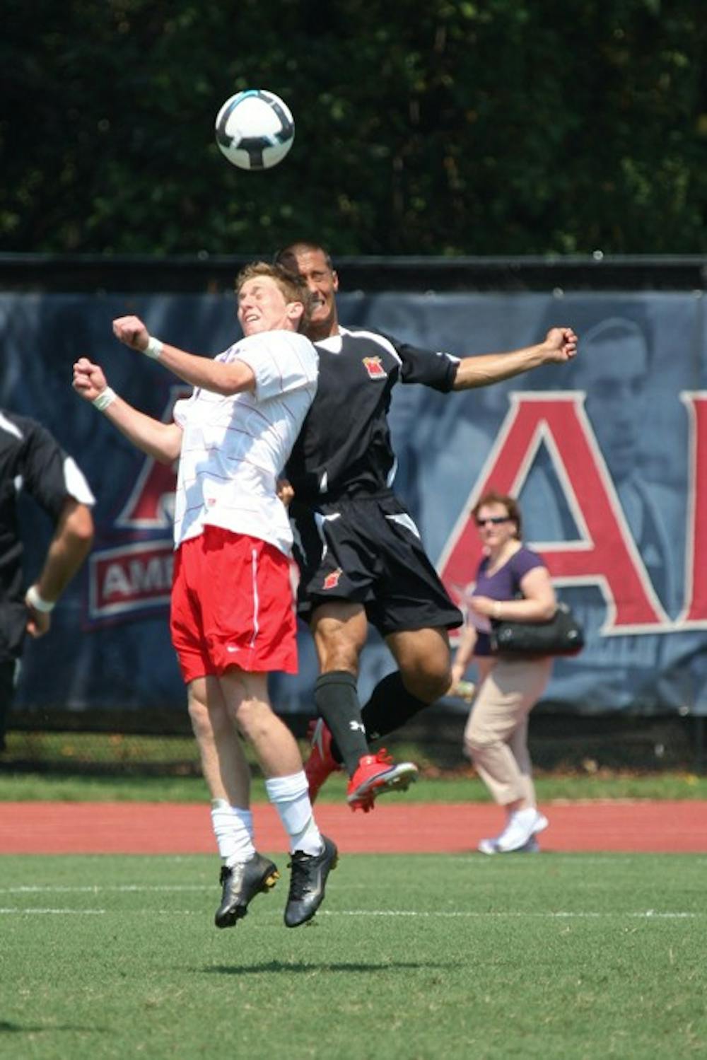 IN THE FRAY - An AU winger goes up for a header in the Eagles tie against Maryland Sunday. Maryland came to AU on a 16-game winning streak dating back to last year. The Eagles surprised themselves with their 1-1 tie against the defending champs.