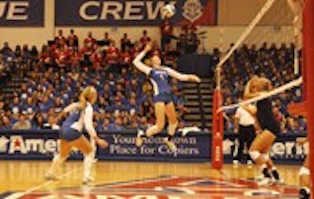 Rising up - Sara Rishell prepares for a spike in Fridayâ€™s Bender Blue Out against George Washington. Rishell had a team-high 14 kills in the season opening loss.