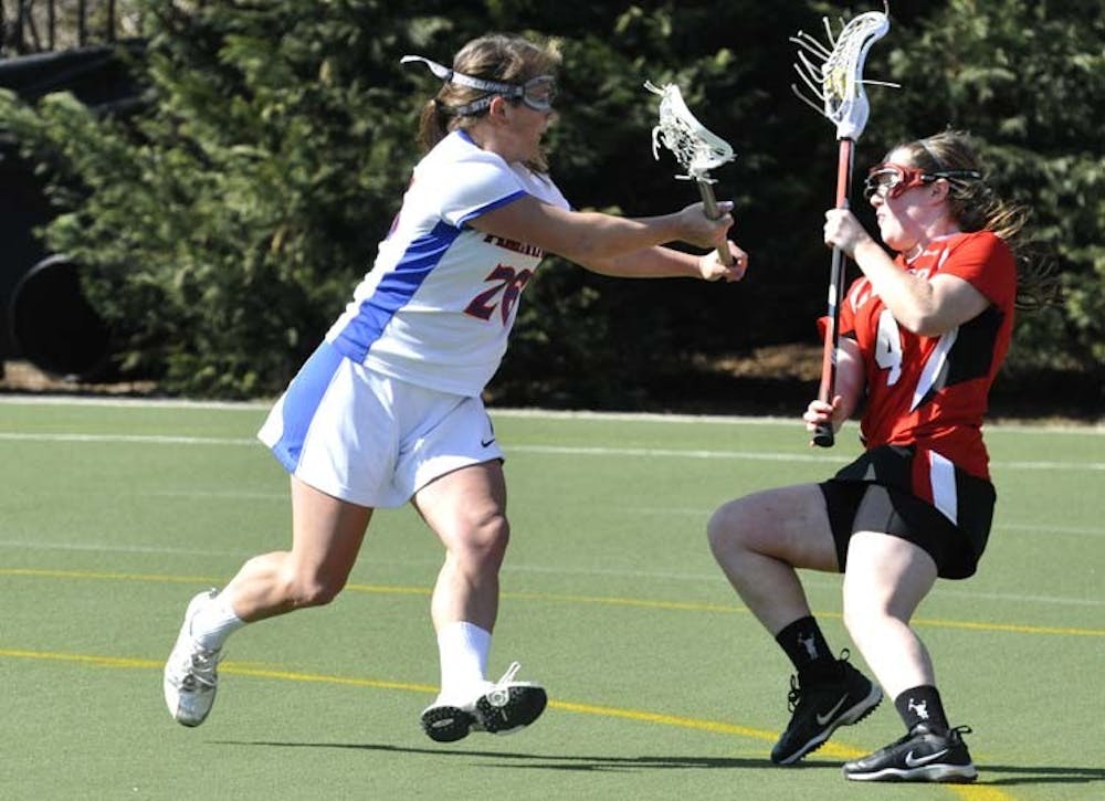 Laura Dawson scooped up one ground ball as AU kicked off the 2012 campaign by defeating Davidson 12-6.