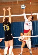 Senior Elizabeth Maloney helped American with three blocks in Friday's game. 