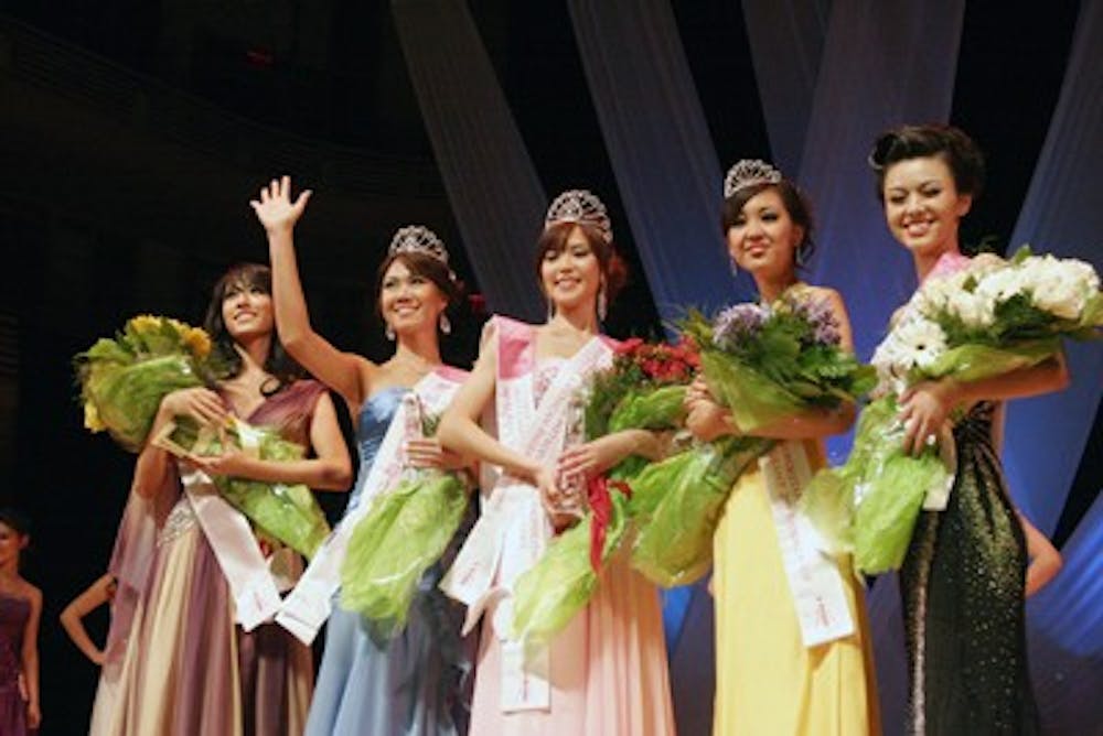 HERE SHE IS â€” AU graduate student Serena Lin (second from left) was the first runner up in the Miss Chinese American pageant, competing against over a dozen other young women for the crown. The competition featured the traditional pageant categories â€” swimsuit, talent, evening gown and Q&A â€” but focused on the unique experiences Chinese Americans face in this country.