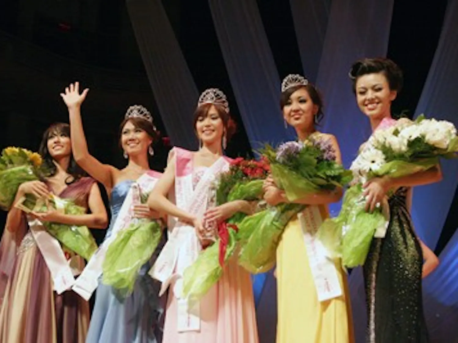 HERE SHE IS — AU graduate student Serena Lin (second from left) was the first runner up in the Miss Chinese American pageant, competing against over a dozen other young women for the crown. The competition featured the traditional pageant categories — swimsuit, talent, evening gown and Q&A — but focused on the unique experiences Chinese Americans face in this country.
