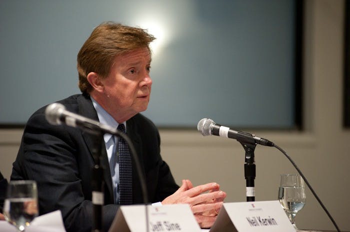 President Neil Kerwin takes students\' questions about the proposed tuition increase and smoking ban at a town hall in the Ward Circle Building Nov. 15.