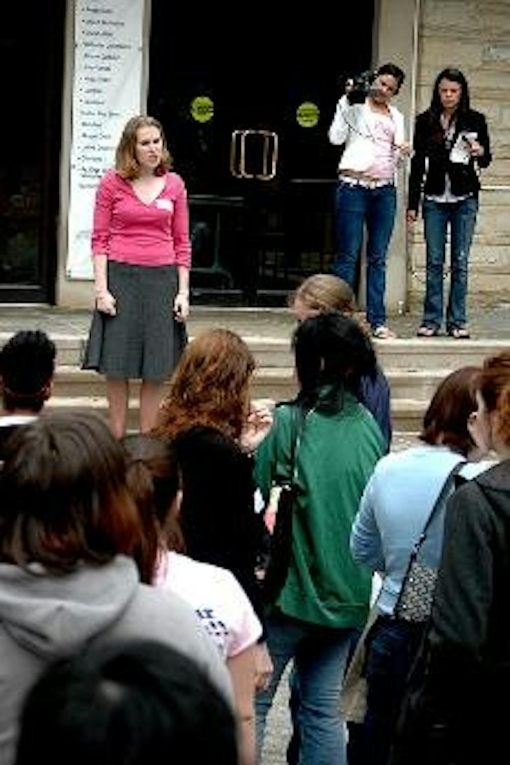 JoAnna Smith speaks to a crowd of supporters after rumors circulated about a by-law amendment to remove Women's Initiative from the Student Government.