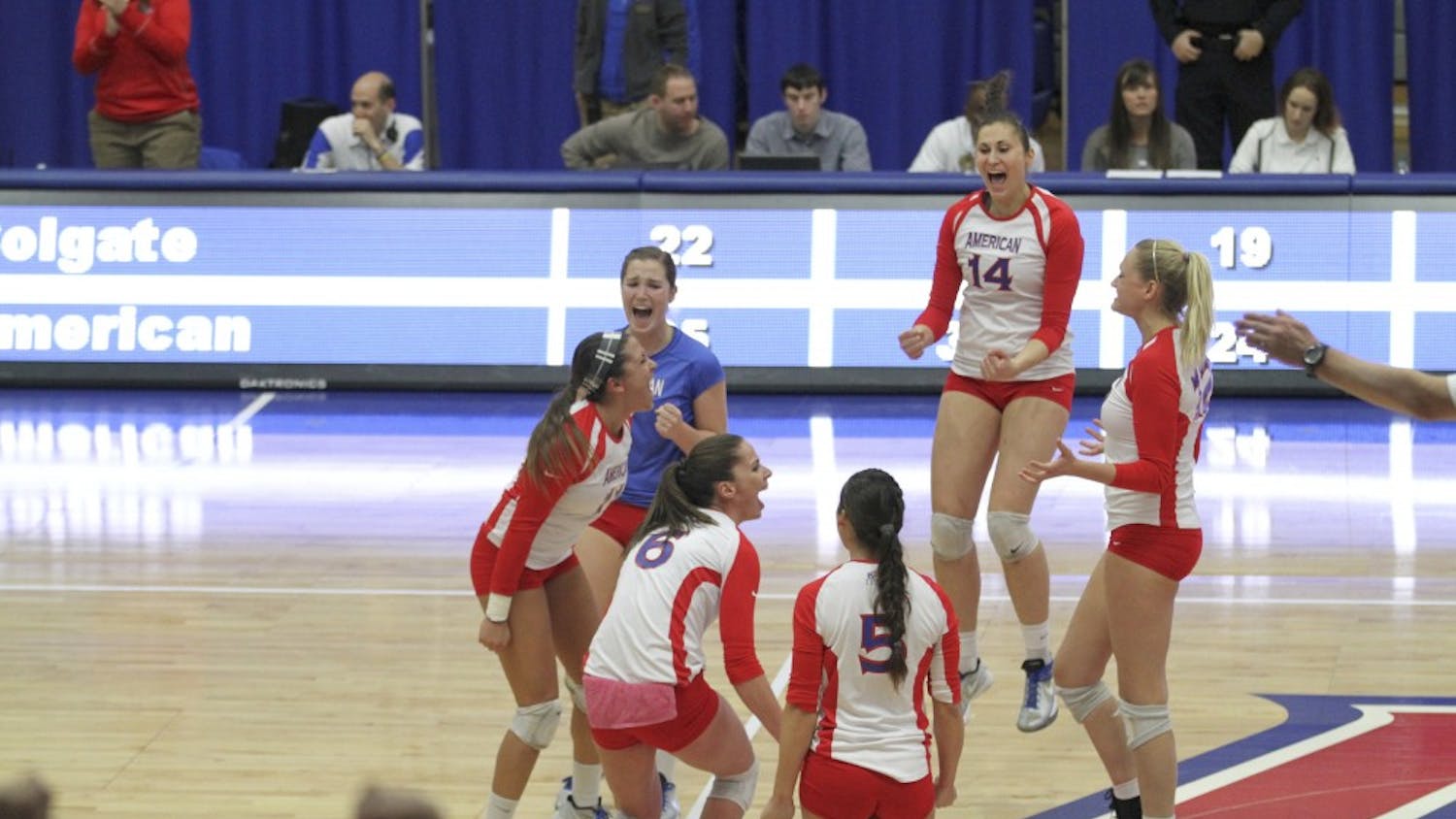	AU volleyball players celebrate their win against Colgate University on Nov. 24 to win the Patriot League Championship.