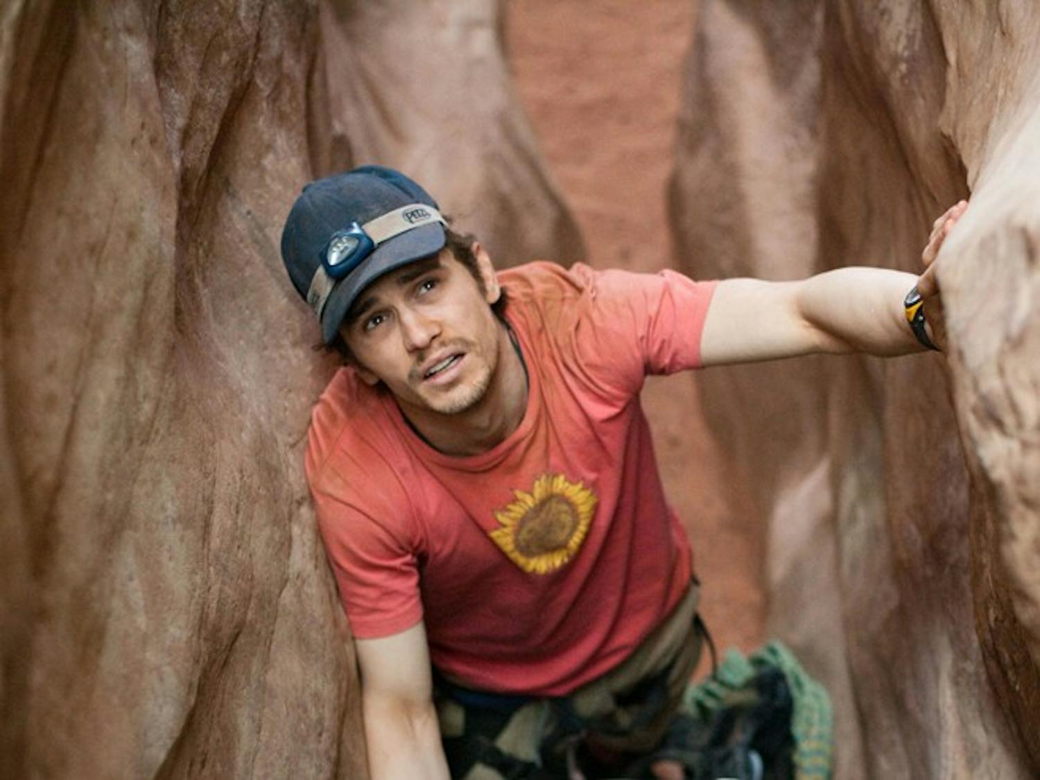 BETWEEN A ROCK AND A HARD PLACE — The latest drama directed by Danny Boyle, “127 Hours,†follows Aron Ralston (James Franco) as he finds himself trapped in a canyon.