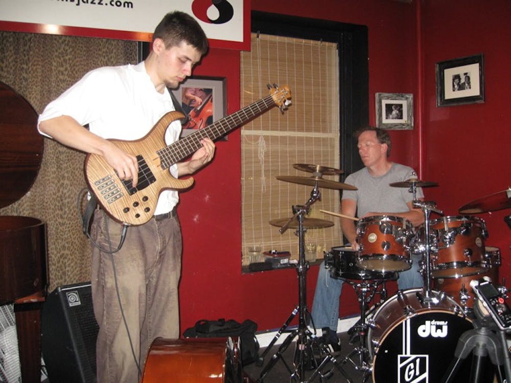 school of rock â€” AU Professor Gregg Ivers (right) moonlights as a drummer in a jazz-funk trio called Zeebop. Their first album, â€œTwisted Standards,â€ was recorded in a studio at the Katzen Arts Center.  Ivers is a professor in SPA, but he manages to balance his musical ambitions with his work, saying that both provide similar satisfaction.