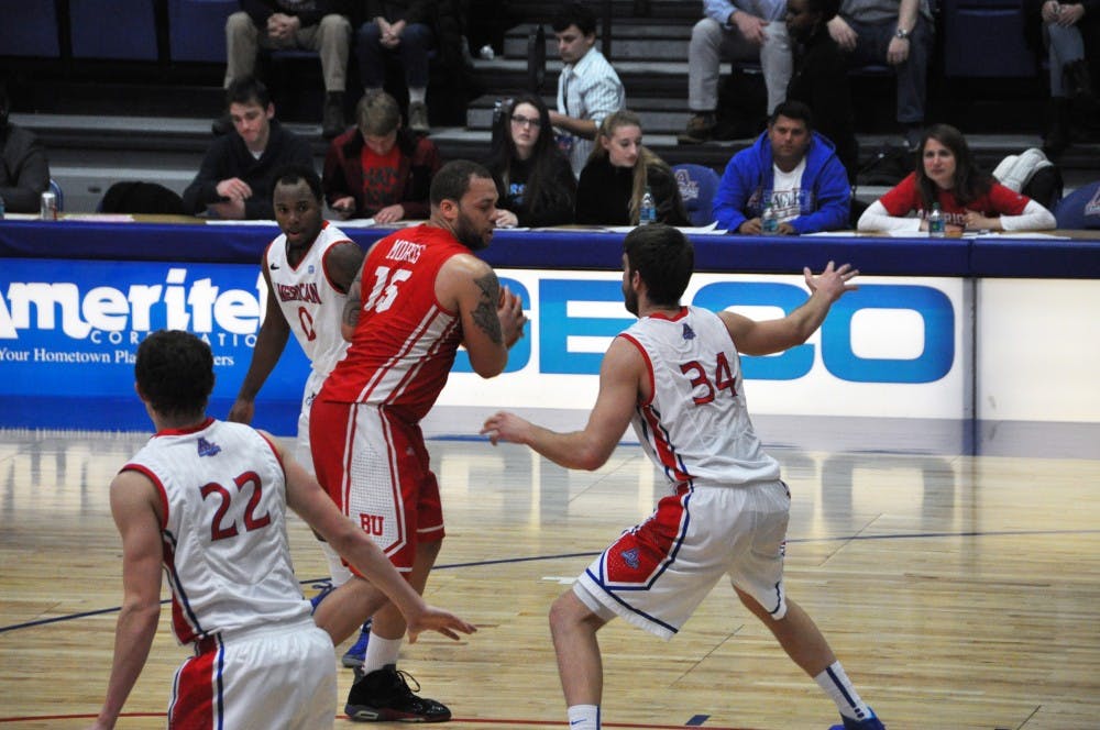 	John Schoof (22) and Tony Wroblicky (34) were part of an Eagle defense which held the Terriers to just 16-of-50 from the field