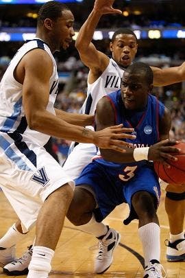 INSIDE MAN - Derrick Mercer makes  a move to the inside during AU's loss to Villanova in the first round of the NCAA tournament on Thursday. AU blew a 14-point lead  in the second half to lose 80-67. 