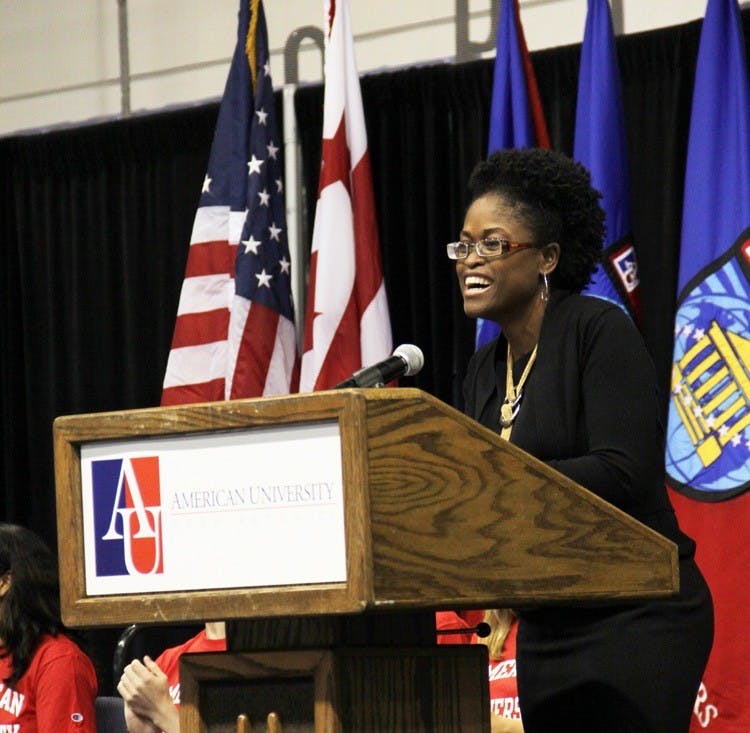 Rising up - Freshmen heard from Center for Community Engagement and Service Assistant Director Robin Adams (left) and D.C. Deputy Mayor of Health and Human Services Beatriz Otero at the FSE closing ceremony Aug. 25 in Bender Arena. 
