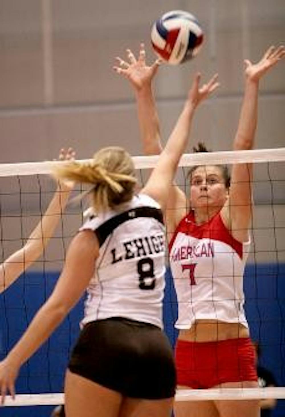 HIGH BLOCK - Junior Rubena Sukaj holds her hands up high to block her Lehigh opponent's ball. The Eagle had five kills against Lafayette and an impressive 20 kills against Lehigh. AU faces Army next, the only PL team to beat the Eagles since they joined t