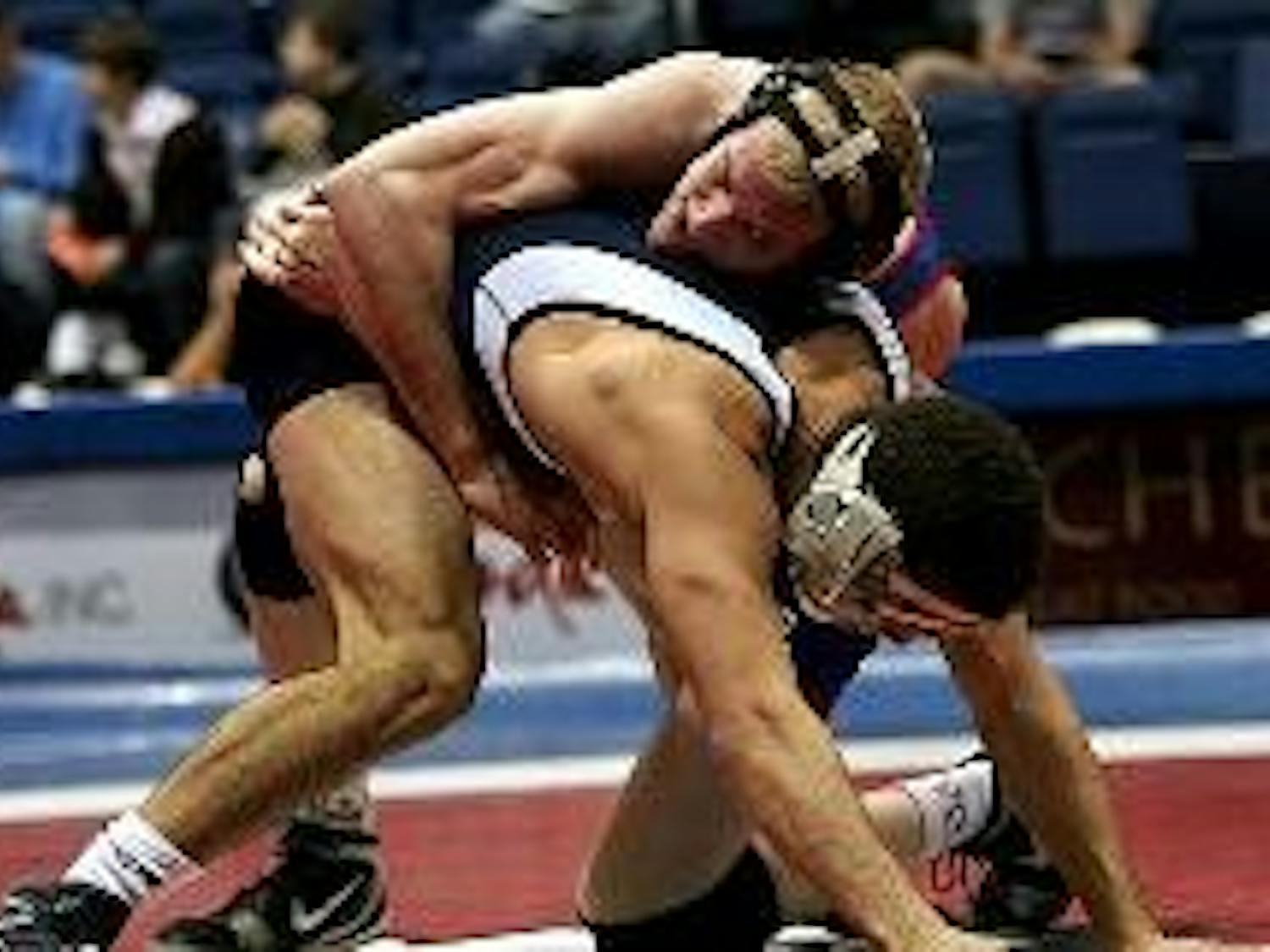 MOUNTING THE MAT - Red shirt sophomore Mike Cannon makes his second appearance at the NCAA tournament this weekend, joined by teammates Josh Glenn, Christopher Stout and Jasen Borshoff. Cannon will look to improve on his two victories that he earned last