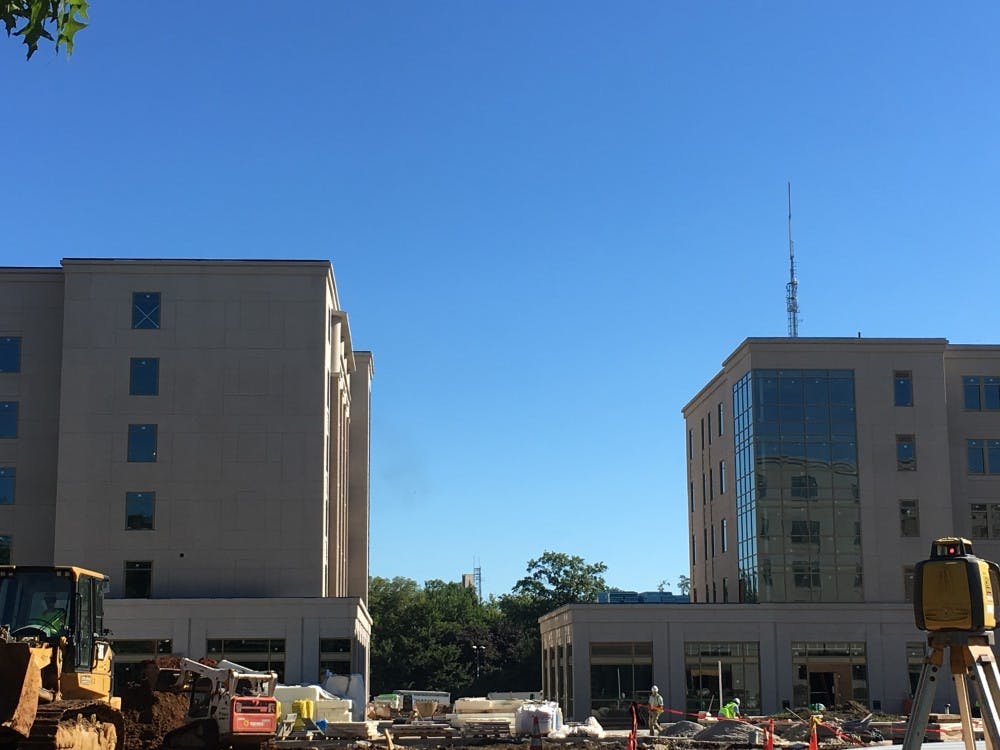 Construction continues on East Campus as students slated to live in the new dorm buildings now move into temporary contingency housing elsewhere on campus.&nbsp;