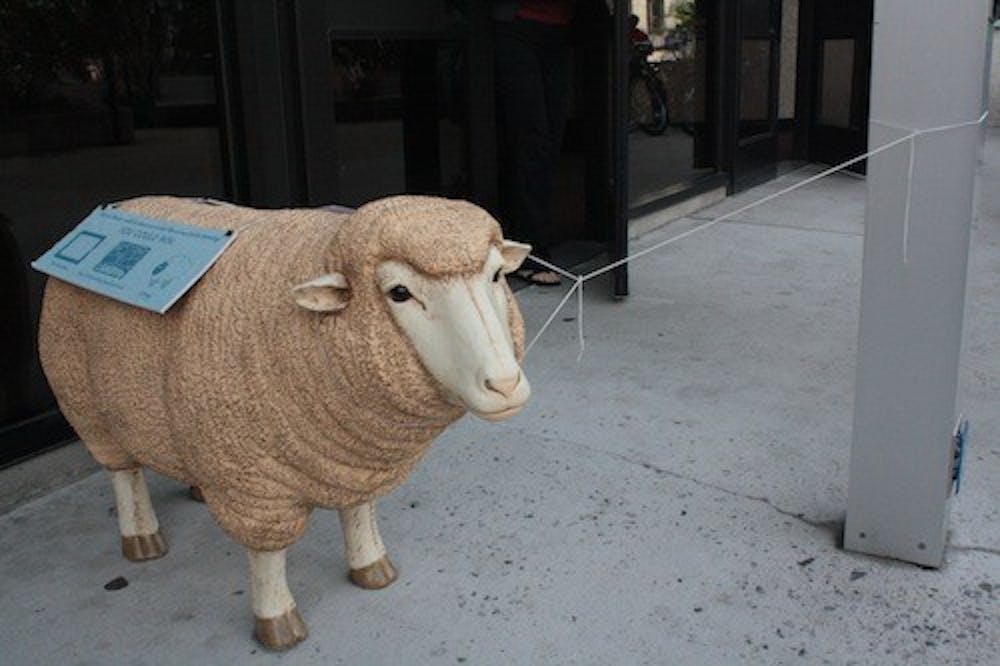	The ceramic sheep sat outside Bender Library in fall 2012. 
