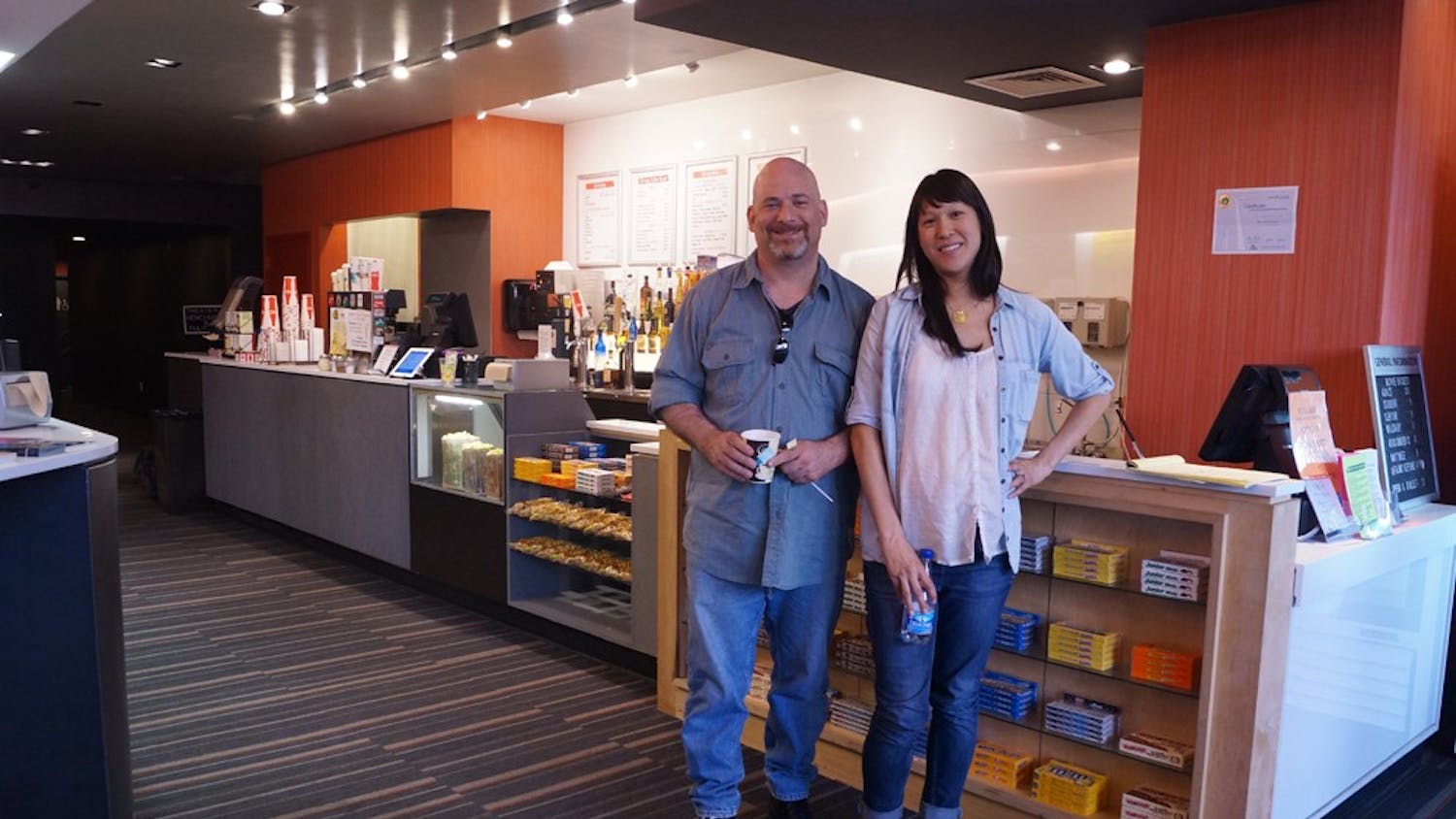 	Owner Josh Levin (left) and Director of Programming Renee Tsao (right) stand in the lobby of the West End Cinema. 