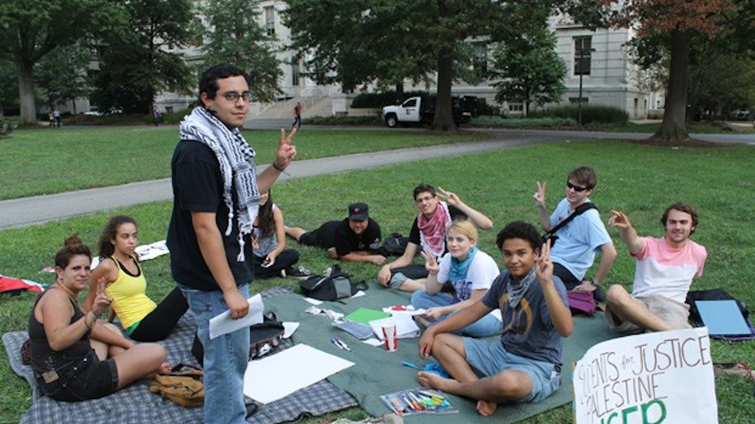 Students create signs for their demonstration on the Quad in solidarity with Palestinian prisoners on Sept. 7.  