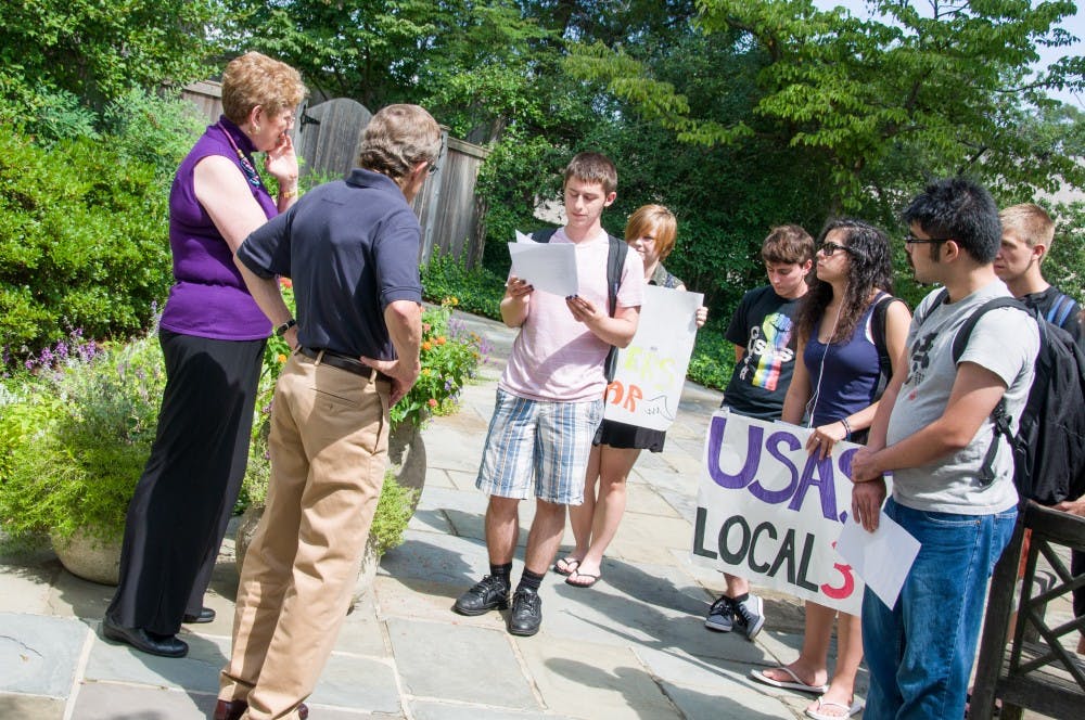 	Students with AU End Deathtraps protest outside of President Neil Kerwin&#8217;s office on Sept. 5.
