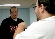 ANSWERING QUESTIONS-SG president Joe Vidulich meets with students in the Anderson Honors Lounge to discuss issues ranging from rising tuition to athletics. When asked about a student Bill of Rights at AU, Vidulich said one was "already in the works."