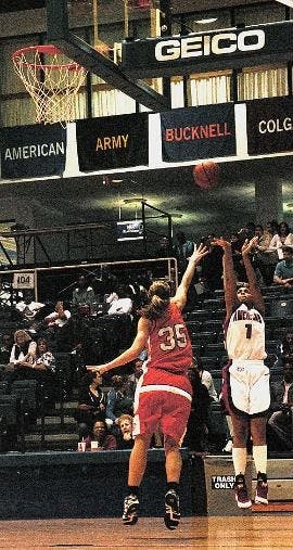 JUMP SHOT- No. 1 Brittany Bell puts up a shot over her Bucknell 	University opponent in last night's game at Bender Arena. Bell scored four points in 11 minutes of play off the bench to help the team win 71-63.  The win improves the Eagles to 7-2 in the P