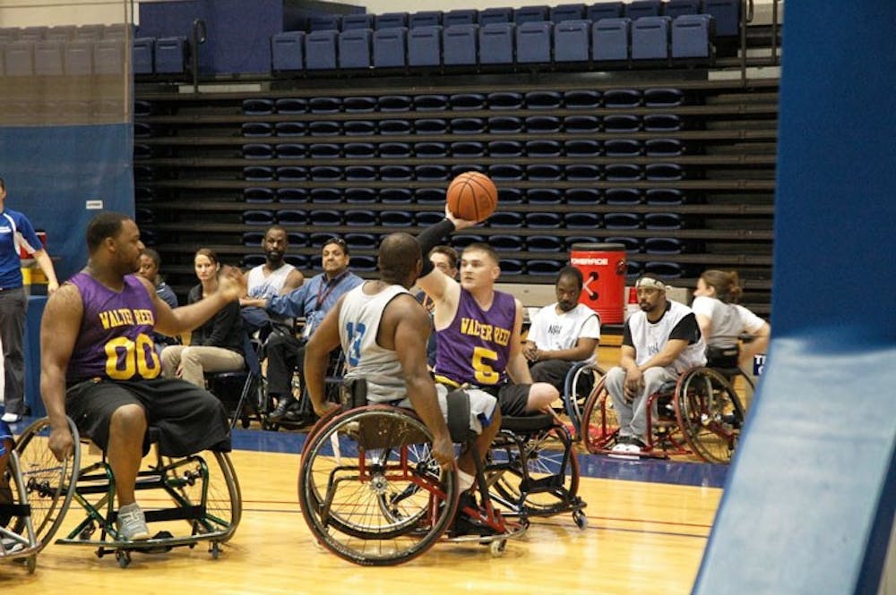 Players compete in the annual U.S. Armed Forces Wheelchair Basketball Game March 29 in Bender Arena. 