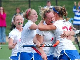 ON TOP - Members of the AU women's field hockey team celebrates their victory over Bucknell on Sunday to clinch their sixth-consecutive Patriot League title. The victory sends the team to the NCAA Play-In Game at home on Tuesday afternoon against Northeas