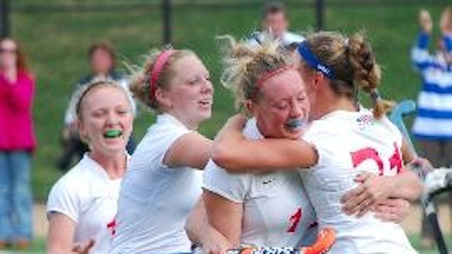 ON TOP - Members of the AU women's field hockey team celebrates their victory over Bucknell on Sunday to clinch their sixth-consecutive Patriot League title. The victory sends the team to the NCAA Play-In Game at home on Tuesday afternoon against Northeas
