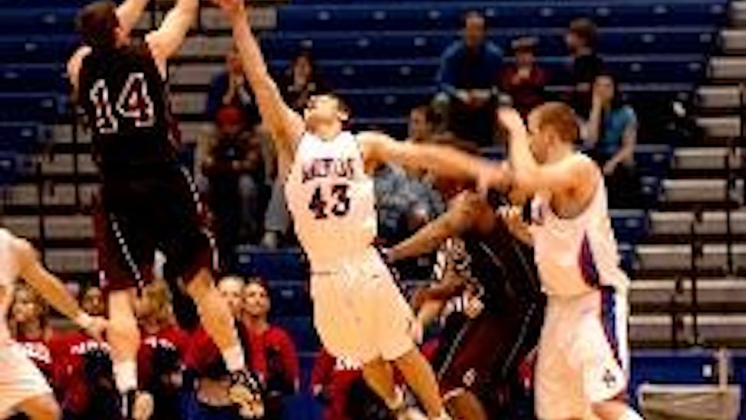 AU fights hard against Holy Cross but falls short of making it to the PL title game.