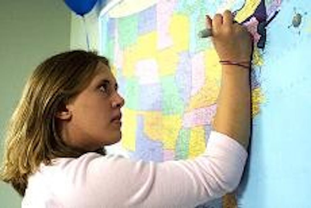 Cassandra Passinault colors her home state of New York blue to mark the Democrats' victory. 