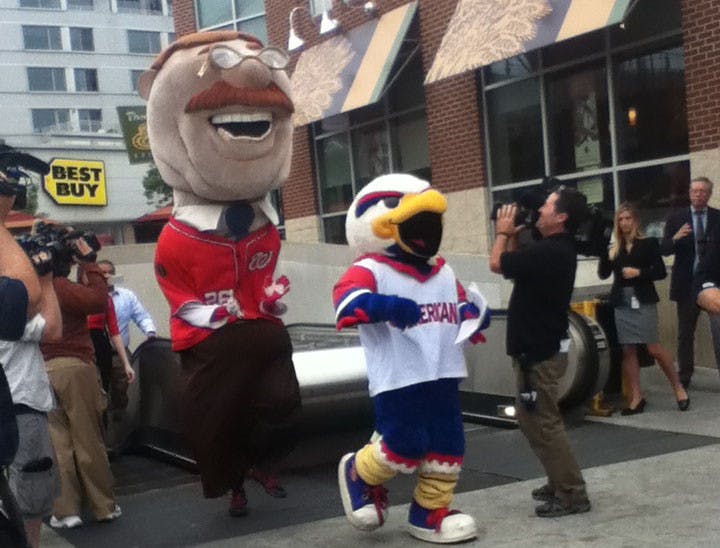 	The Nationals’ mascot Teddy Roosevelt and Clawed Z Eagle outside of the Tenleytown metro station.
