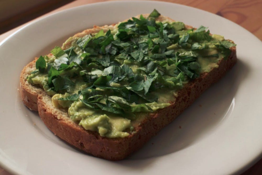Avocado toast with mint, parsley and lemon juice
