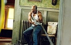 Samuel L. Jackson reels in a misbehaving Christina Ricci in the tempting new film 'Black Snake Moan.'