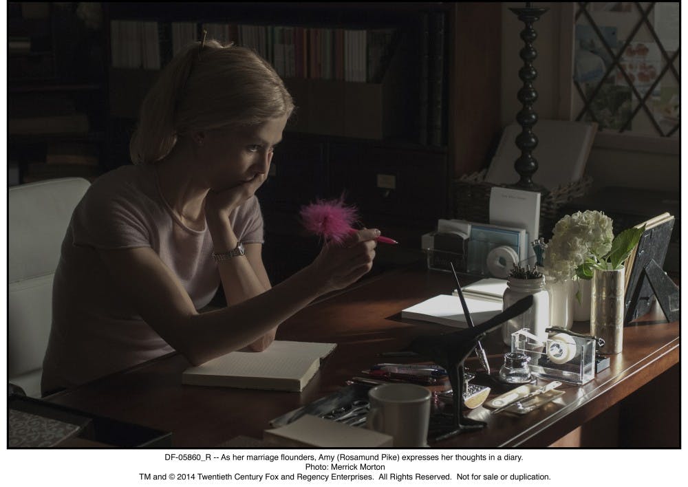 DF-05860_R -- As her marriage flounders, Amy (Rosamund Pike) expresses her thoughts in a diary.  
