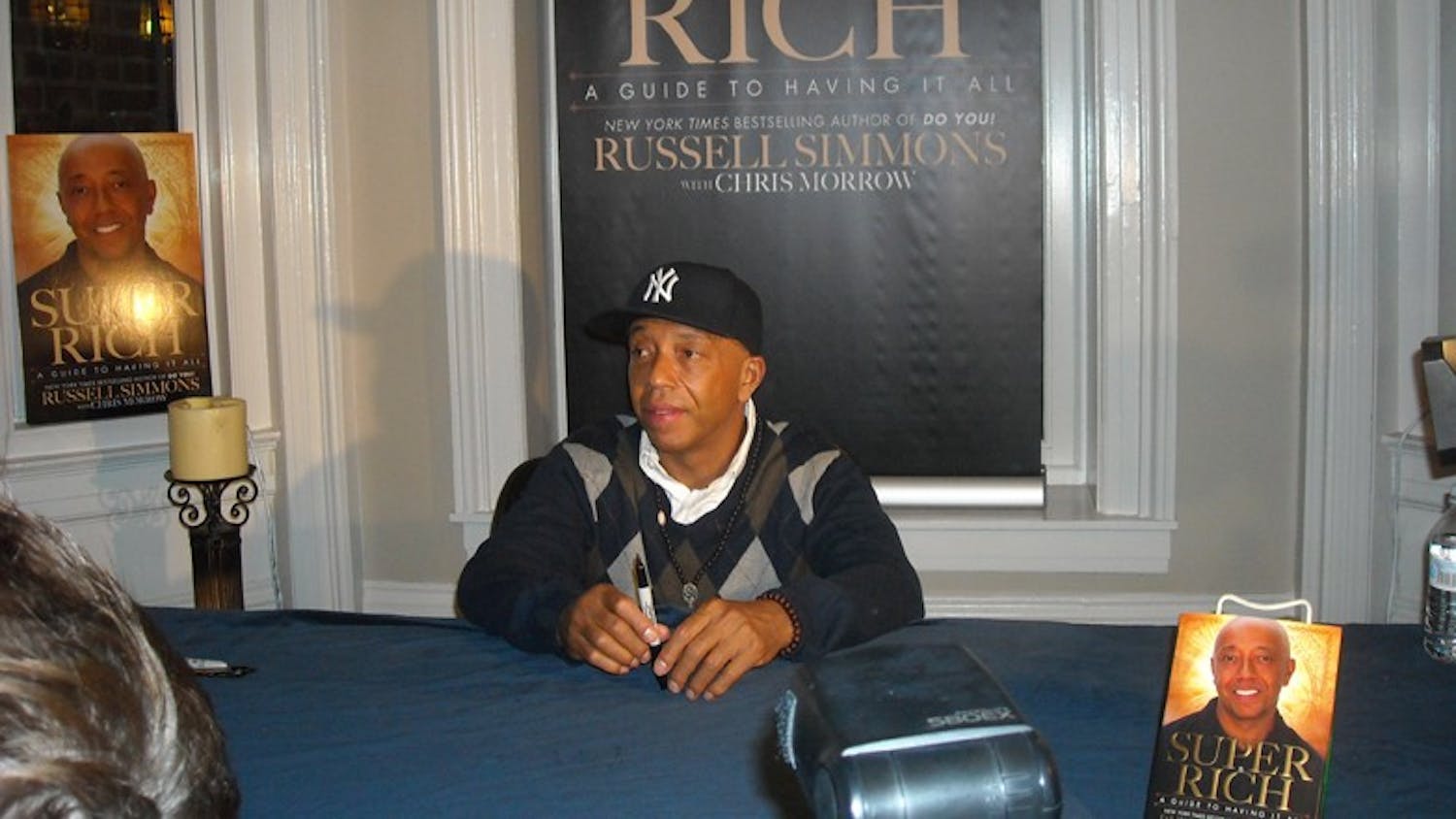 CELEBRITY GURU â€”  Self-made millionaire Russell Simmons has published a second book, ambitiously titled, â€œSuper Rich: A Guide to Having it All.â€ The star lays down rules for how to gain spiritual wealth.