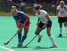 DRIBBLING FOR THE WIN- Junior Katie Turner avoids her opponent as she takes the ball up the field toward the goal. The AU Eagles continued to defend their thus far undefeated record. The Eagles will face Kent State at Northwestern University this Saturday