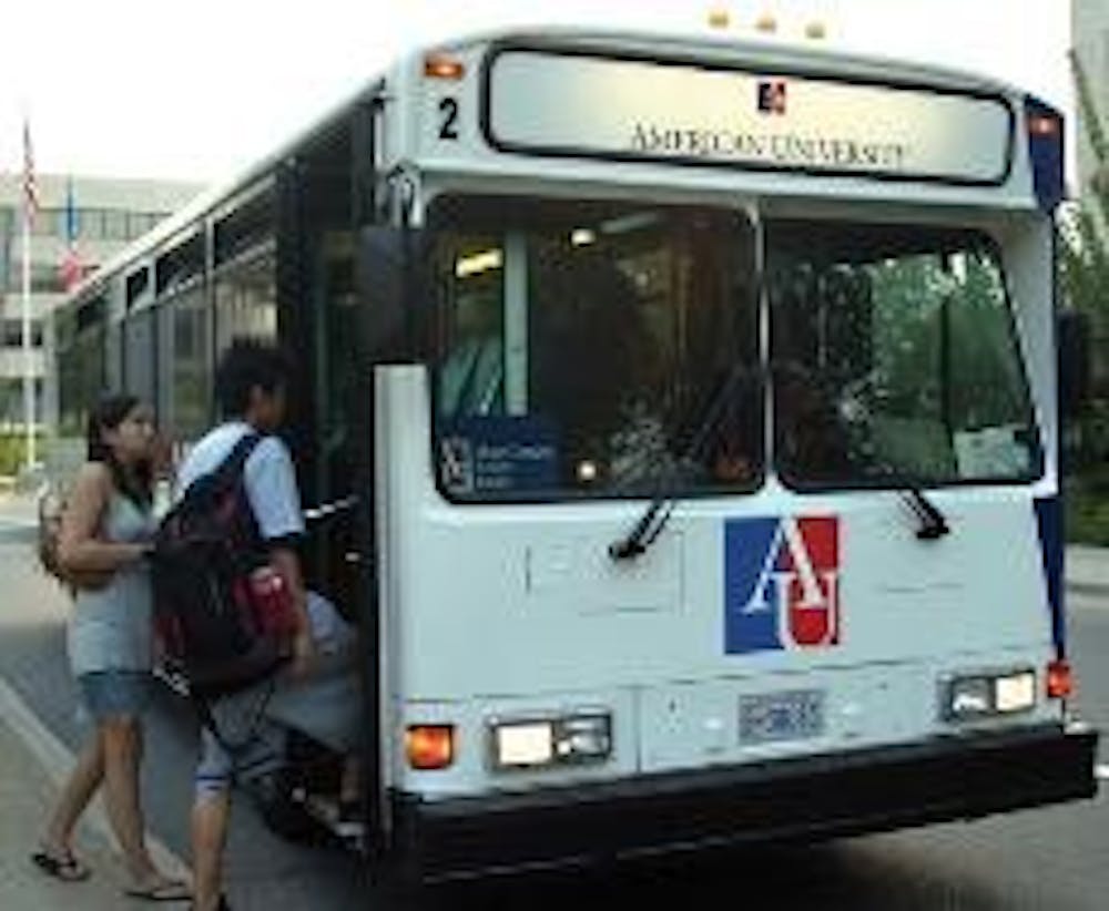 TO TENLEY - Students board the AU shuttle at the North side stop to Tenleytown. The shuttle drivers are currently attempting to unionize.