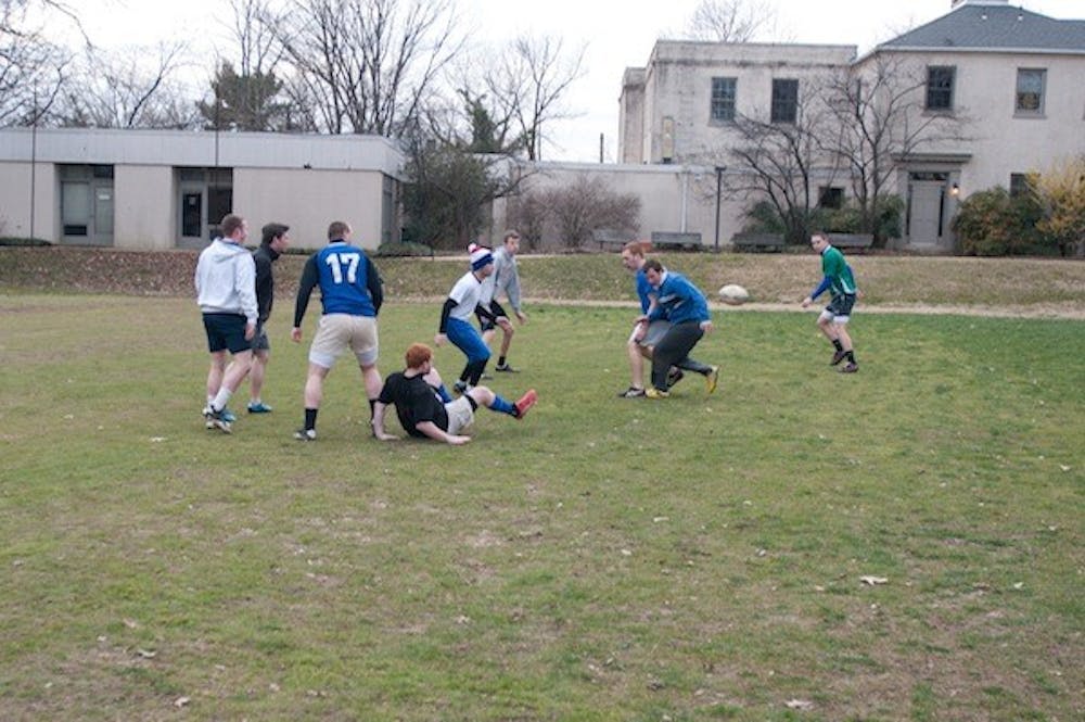 AU students playing rugby on Tenley Campus.