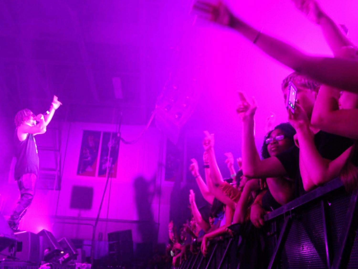 Lupe Fiasco plays for a crowd of AU students in Bender Arena on Aug. 24, 2013, a Welcome Week concert hosted by the Student Union Board.