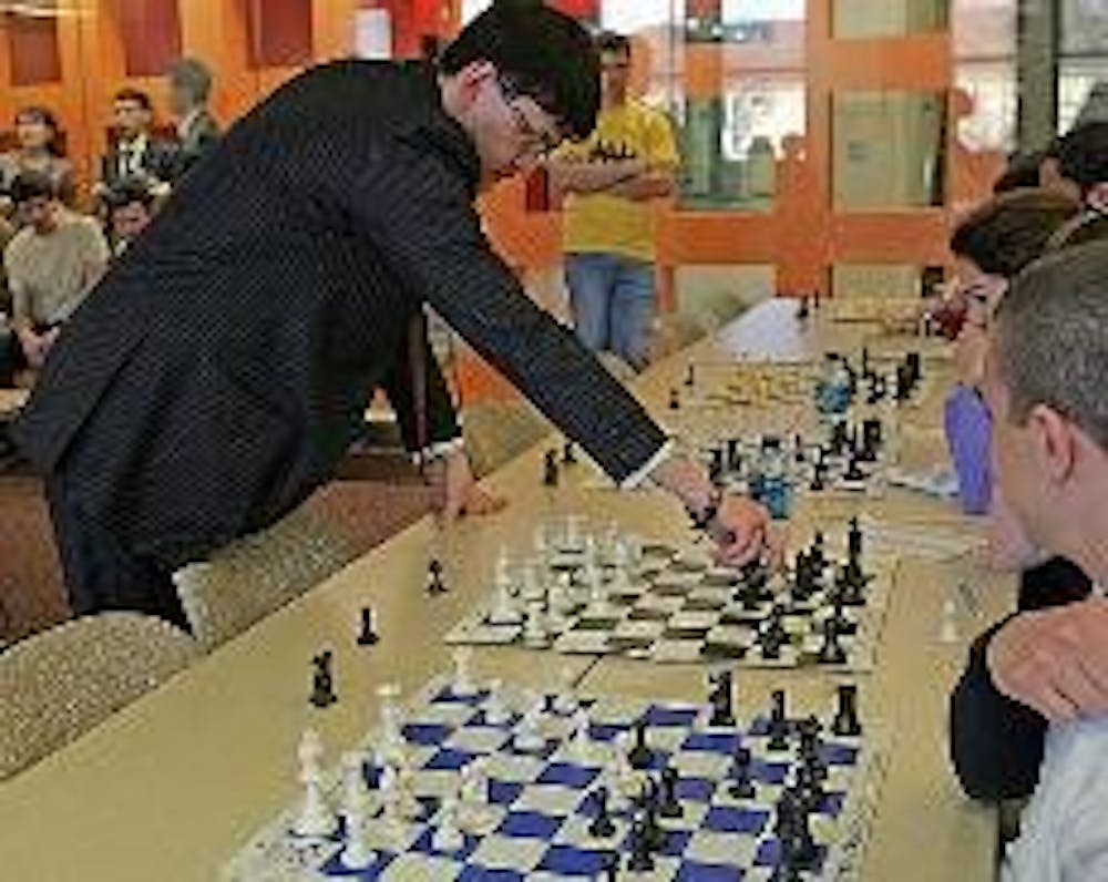 Local players battle on the chess board, Archives