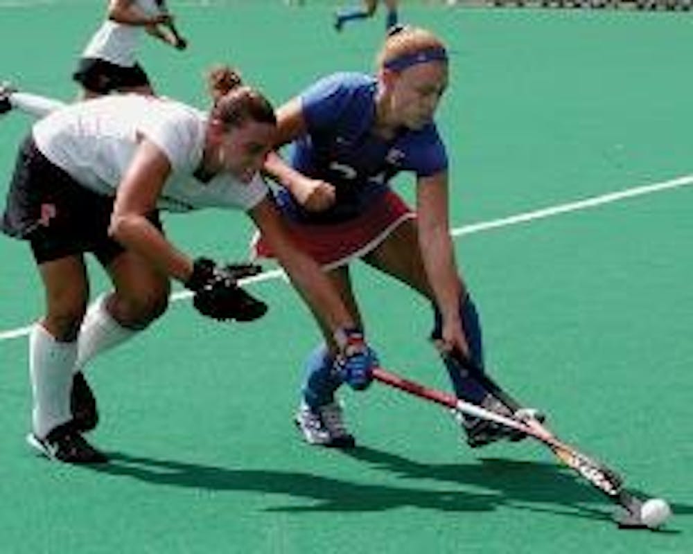 Junior Midfielder Megan Henry plays keep away with her opponent from Princeton in Sunday's game. The Eagles won 3-2 in the second game of the weekend, bringing the team's record to 4-0 and placing them in the No. 12 rank for the Patriot League.