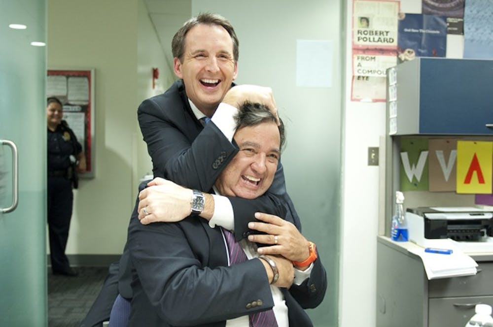 Gov. Tim Pawlenty, R-Minn., puts Gov. Bill Richardson in a friendly sleeperhold before their discussion in Bender Arena on Oct. 20.