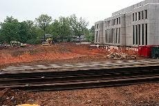 IF YOU BUILD IT - Construction continues on the School of International Service building, which workers expect to be completed by 2010. Over the summer, while most students are living off campus, Centennial Hall will receive new carpeting and new air-cond