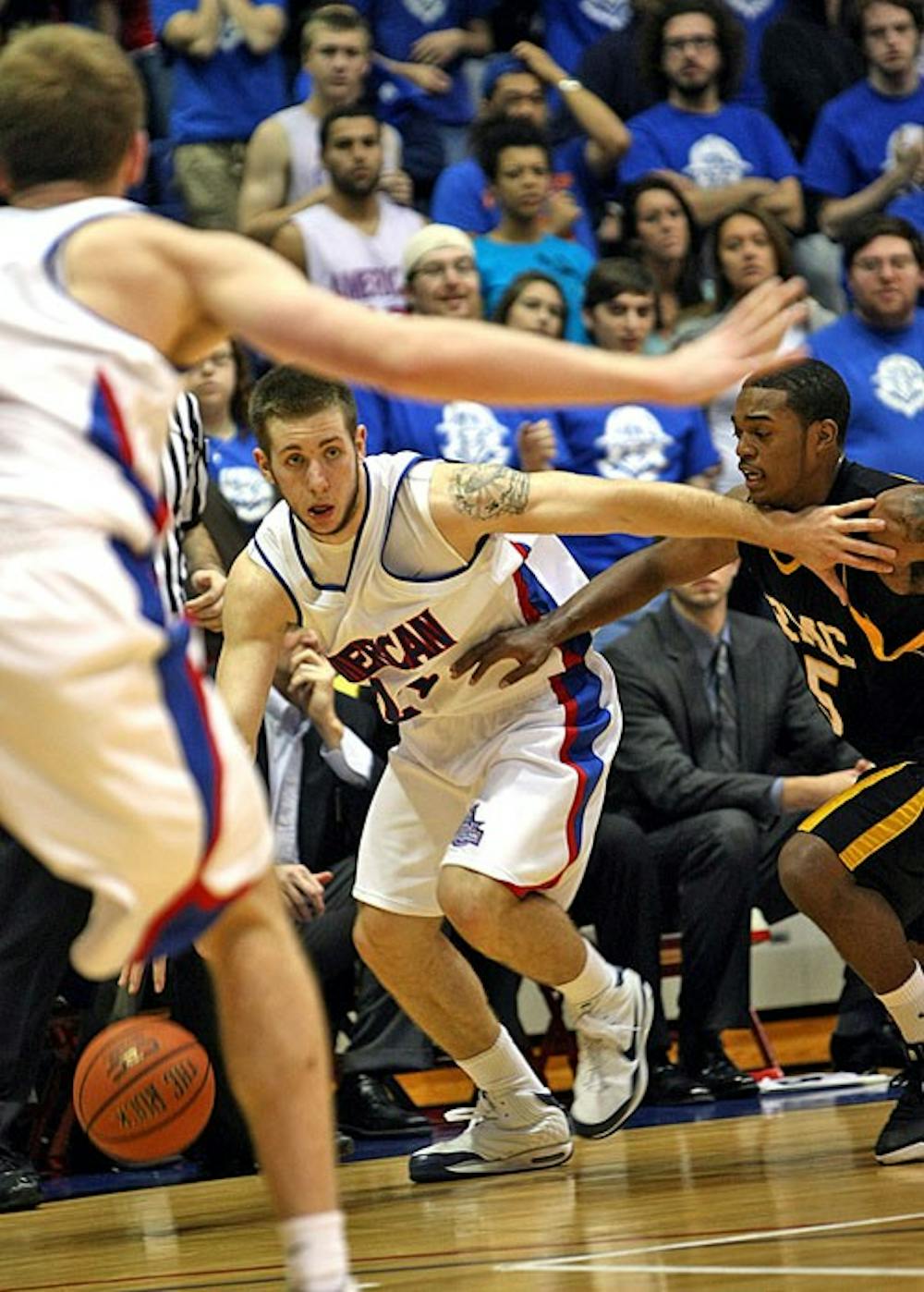 DROPPING THE BALL â€” Junior Nick Hendra takes the ball up the court in AUâ€™s 49-47 loss to Randolph-Macon College Tuesday night. While it was only an exhibition game, the sloppy play may be a cause for concern. Head Coach Jeff Jones said the squad needs to find an identity in order to win. They play Catholic University on Nov. 8.