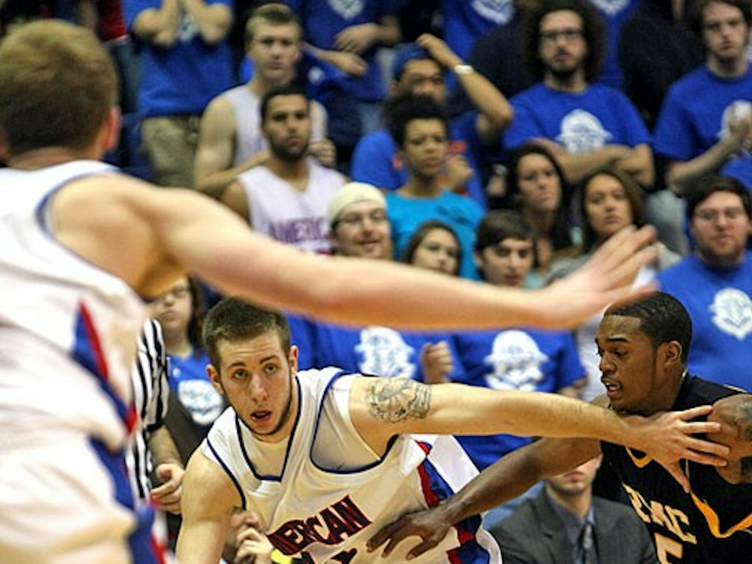 DROPPING THE BALL — Junior Nick Hendra takes the ball up the court in AU’s 49-47 loss to Randolph-Macon College Tuesday night. While it was only an exhibition game, the sloppy play may be a cause for concern. Head Coach Jeff Jones said the squad needs to find an identity in order to win. They play Catholic University on Nov. 8.