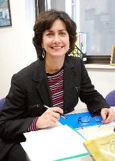 HELPING HAND - As director of AU's Community Service Center, Marcy Campos oversees all service programs at the university, including alternative break trips. 